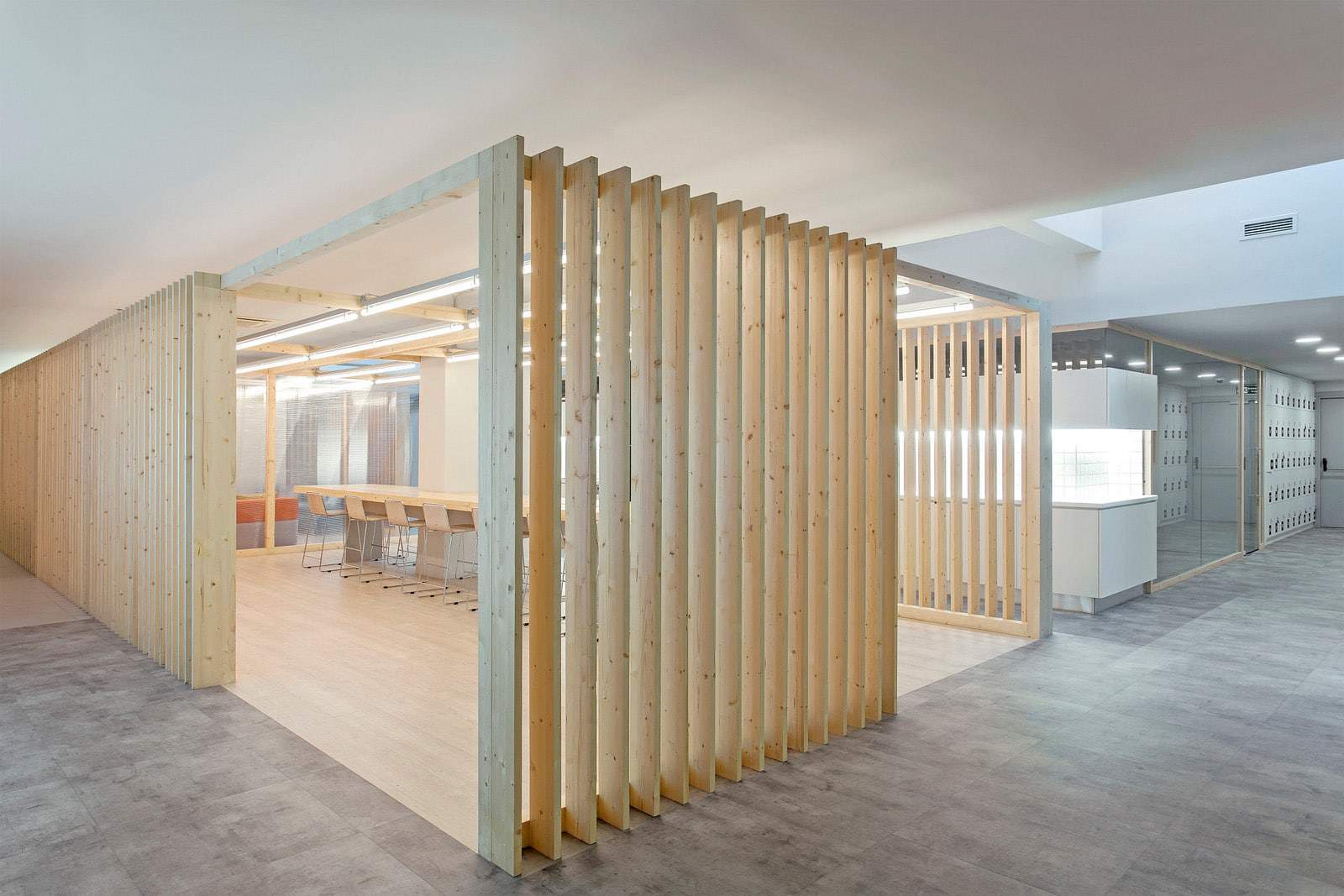 Meeting room with shutter style wood frame walls