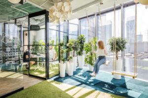Glass meeting room with indoor swings