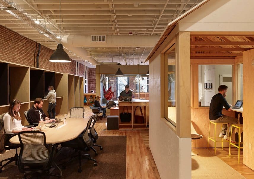 Open plan office space and office pod at AirBNB