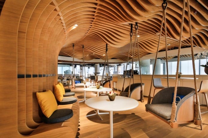 Suspended chairs in a modern office setting