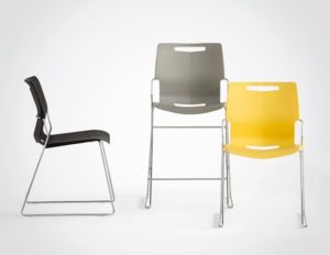 Touch chairs in black, yellow and dark grey on a light grey background