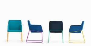 Touch armchairs by Workagile shown with multicoloured legs and upholstery
