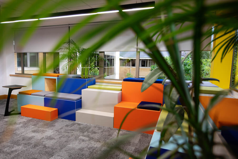 Vibrant Huddlebox with planters in office