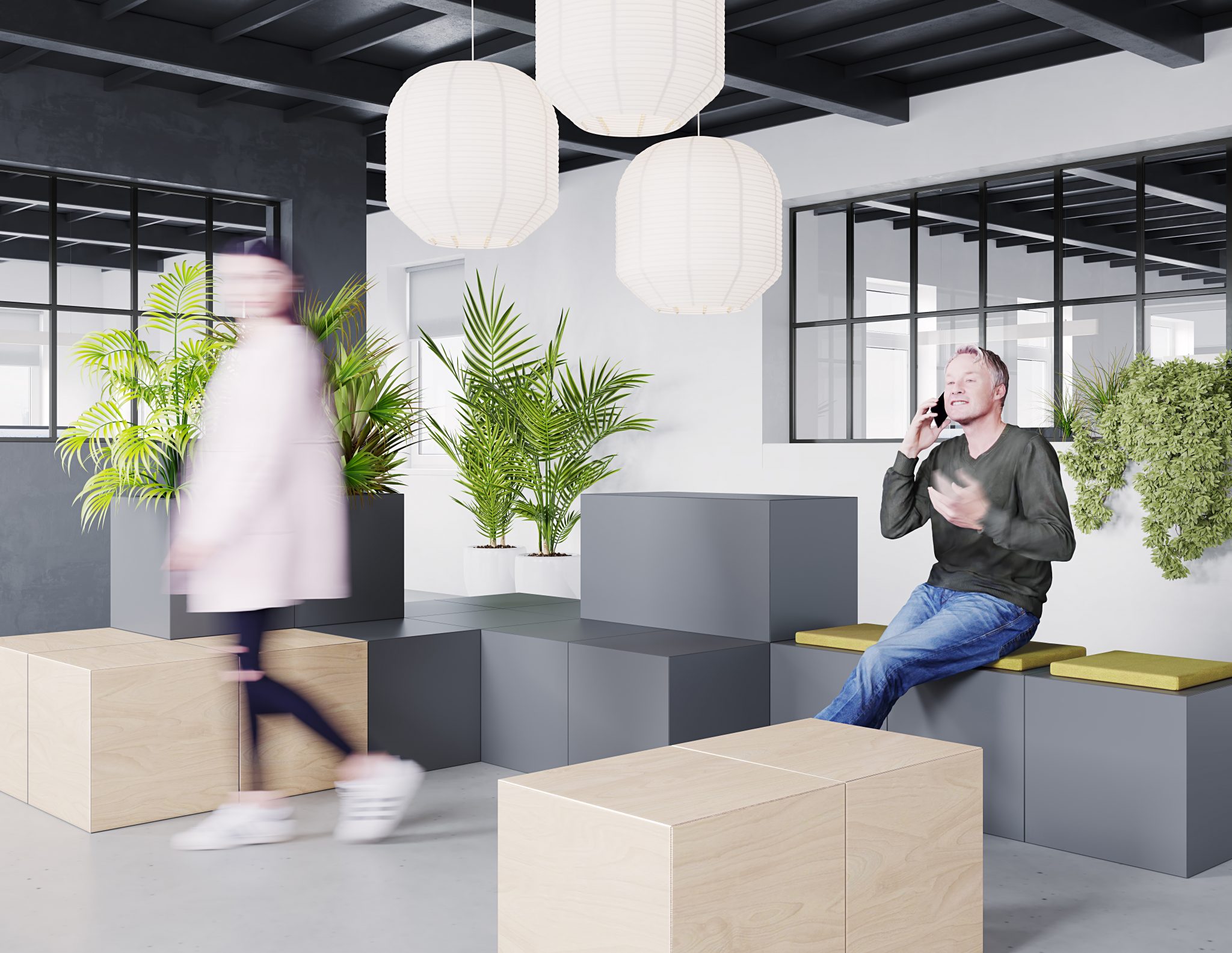Man on telephone sitting on Work Agile Huddlebox